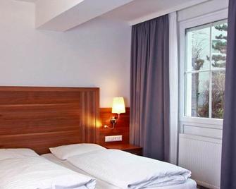 فندق آيتليورغ - فيينا - غرفة نوم