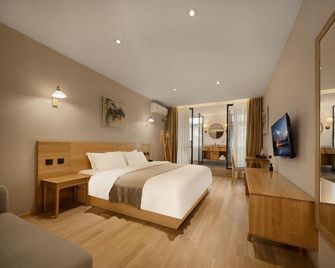 Xu Lai Boutique Hotel (Chengdu Railway Station, Shiqiaopu Chenjiaping, Chongqing) - Chongqing - Bedroom