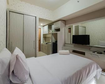 Relax Studio at Vida View Makassar Apartment By Travelio - Makassar - Bedroom