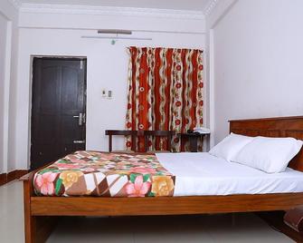 Sree Krishna Residency - Guruvayoor - Camera da letto