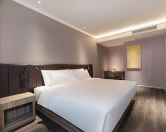 Hanting Hotel Nanjing Liuhe Xiongzhou Metro Station - Nanjing - Bedroom