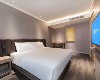 Hanting Hotel Nanjing Liuhe Xiongzhou Metro Station - נאנז'ינג - חדר שינה