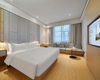 Ji Hotel Anji Shengli Xi Road - Huzhou - Slaapkamer