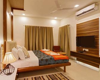 Hotel Woodland - Kolhapur - Camera da letto