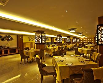 Best Inn Hotel - Chhāgalnāiya - Restaurante