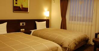 Hotel Route-inn Natori - Iwanuma - Bedroom