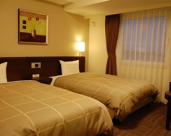 Hotel Route-inn Natori - Iwanuma - Bedroom