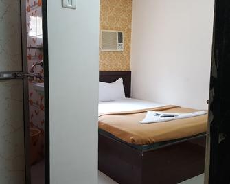 Hotel Al Mehraj - มุมไบ - ห้องนอน