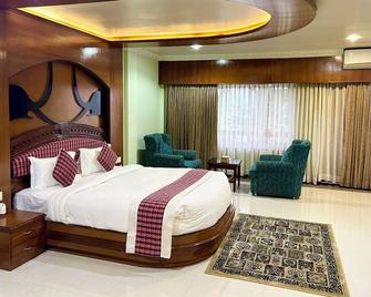 Hotel Earth Light - Chitwan - Bedroom