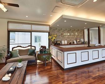 Wayn-Zen Onna Hotel - Onna - Rezeption