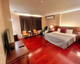 England Business Motel - Yilan - Schlafzimmer