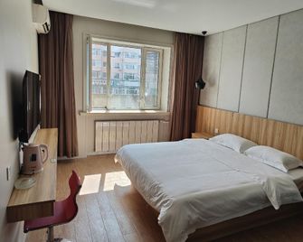 Jianrun Hotel - Daqing - Schlafzimmer