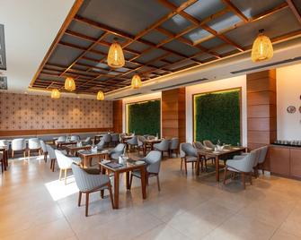 Krishna's courtyard Hotel & Convention - Cuttack - Restaurante