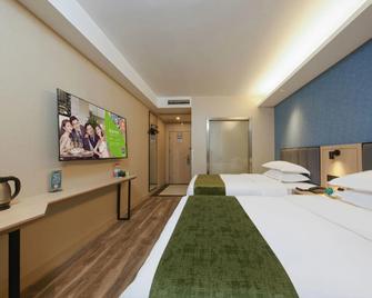 Greentree Inn Jiangsu Changzhou Henglin Town Shuntong Road Express Hotel - Changzhou - Habitación