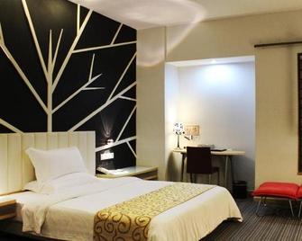 Guangjia Business Hotel - Qingyuan - Bedroom
