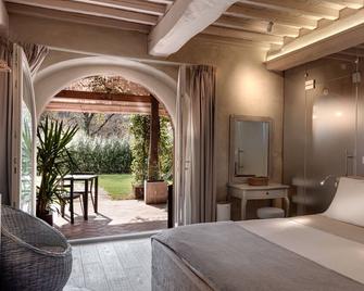 Cuprena - Capolona - Habitación