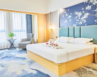 Baiyulan Hotel (Yichang Cbd Shopping Center Branch) - Yichang - Chambre