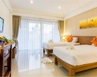 Palmari boutique hotel - Krabi - Camera da letto