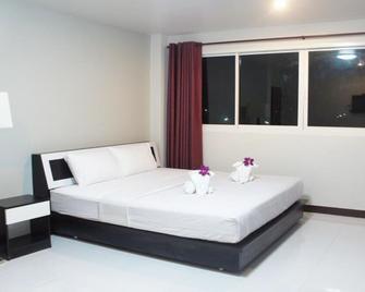 Nan Treasure Hotel - Nan - Schlafzimmer