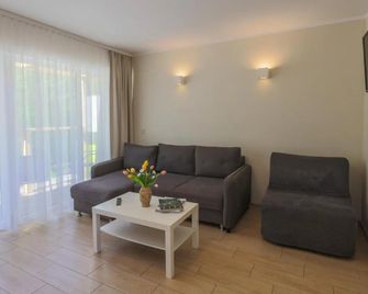 Domki Apartamentowe Bravo - Bobolin - Pokój dzienny