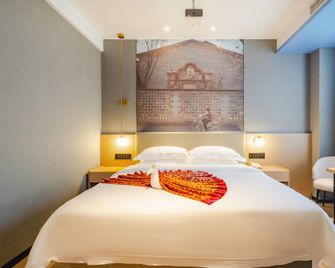 Shangjin Hemei Hotel Tianxiang Branch - Chengdu - Schlafzimmer