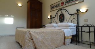 Hotel Minerva E Nettuno - Venedig - Schlafzimmer
