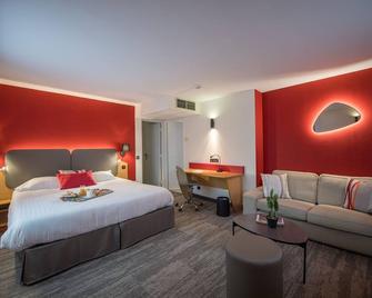 Promotel - Carros - Habitación
