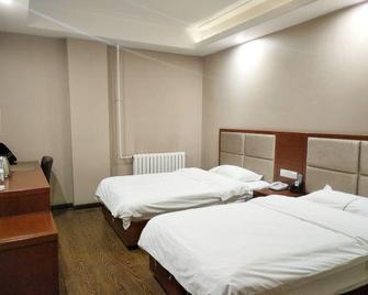 Huaxi Hotel - Harbin - Habitación