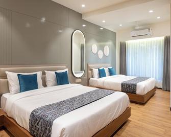 The Zuree Hotel - Gandhinagar - Schlafzimmer