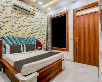 Hotel O Family Lodge - Hānsi - Bedroom