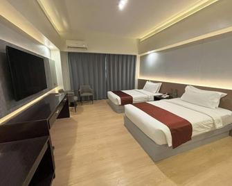 Lido De Paris Hotel - מנילה - חדר שינה