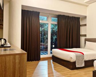 Airo Hotel Manila - Manilla - Slaapkamer