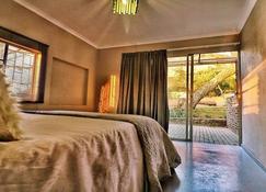 White rock self-catering guest suites. Unit 1 - Nelspruit - Bedroom