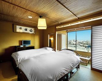 ياماتويا بيسو - ماتسوياما - غرفة نوم