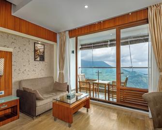 أمبر دالي لاكشري هوتل آند سبا - مونار - غرفة معيشة