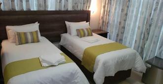 First Avenue Guest house - Gaborone - Bedroom