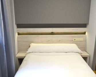 هوتل ألدا سنترو أفيدو - أوفييدو - غرفة نوم