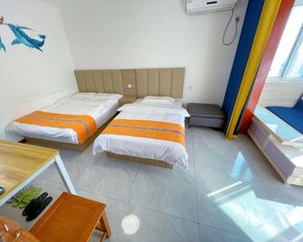 Xi'an Aimei apartment - Xi'an - Habitación