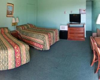 Holiday Host Motel - Sonora - Schlafzimmer