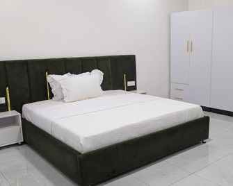 Home Apartment - Kigali - Slaapkamer
