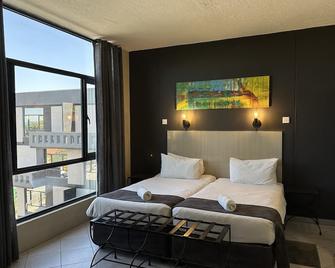 N1 Hotel Samora Machel Harare - הררה - חדר שינה