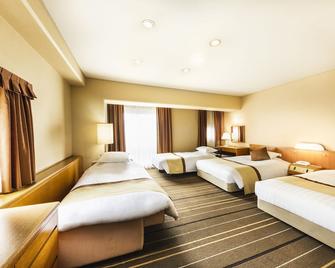 Senri Hankyu Hotel Osaka - Toyonaka - Camera da letto