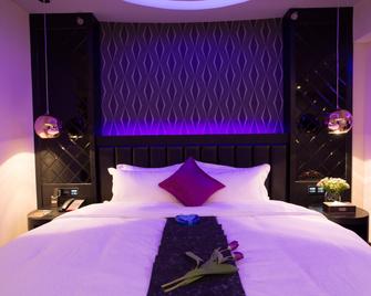 U Hotels - Kunming - Schlafzimmer