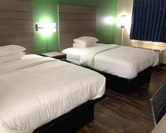 Travelers Inn and Suites Wharton - Wharton - Ložnice