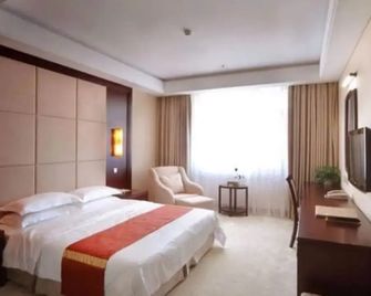 شينيانج سيفيل أفياشن هوتل - شينيانغ - غرفة نوم