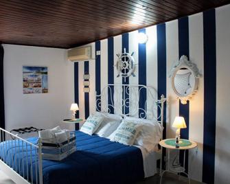 Oasi Del Gabbiano - סירקוזה - חדר שינה