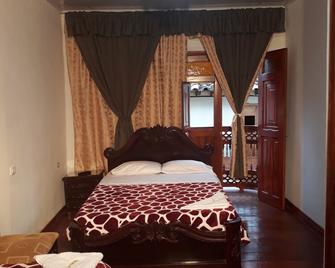 Bonsai Casa Hotel - Salamina - Camera da letto