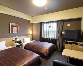 Hotel Route Inn Shinfuji Ekiminami - Fuji - Slaapkamer