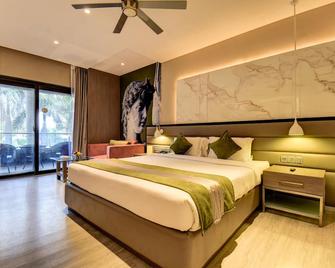 The Corinthians Resort & Club - Pune - Schlafzimmer