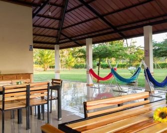 Farm Hotel Magic Paradise - Nueva Loja - Patio